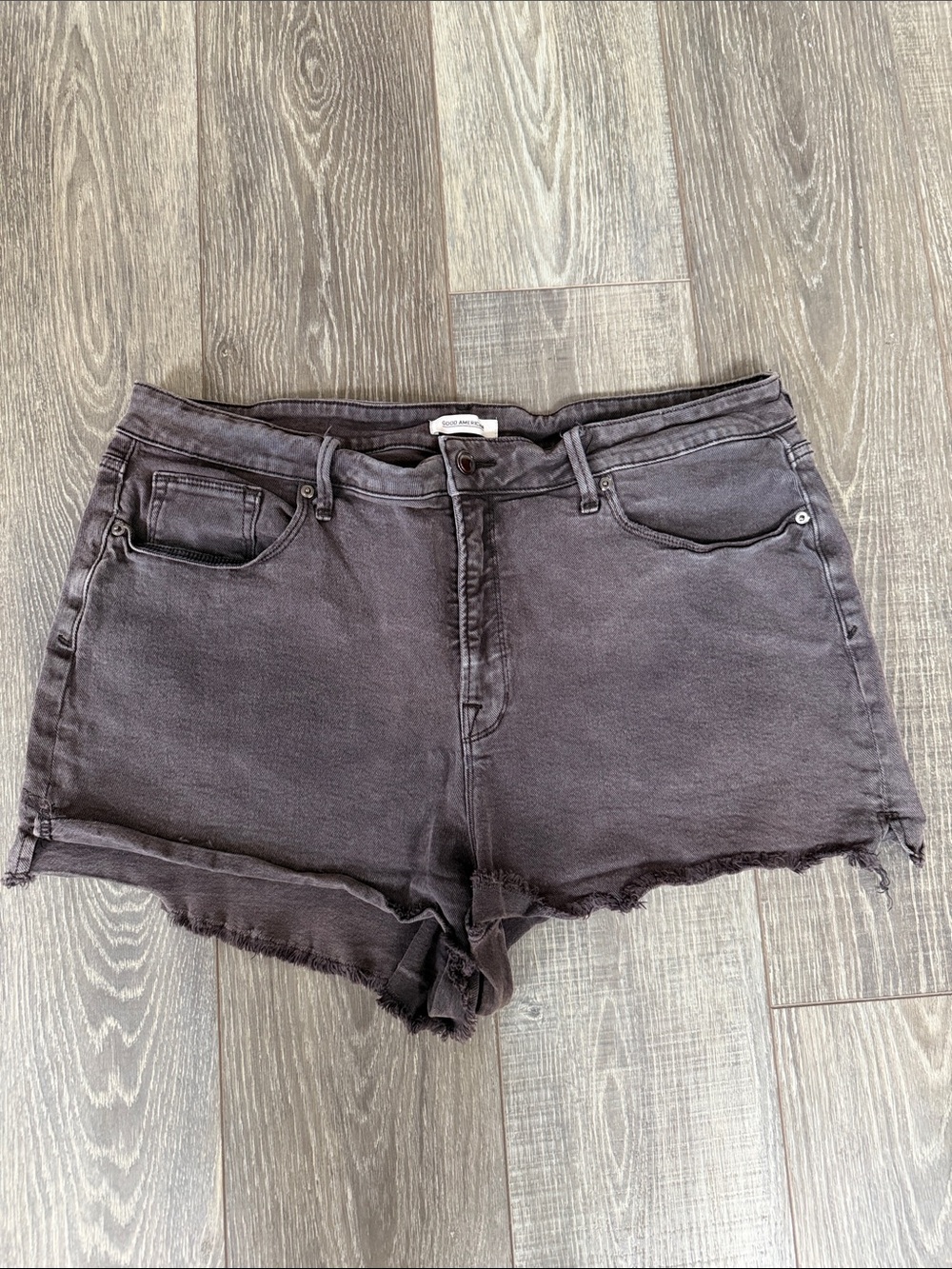 Good American Washed Charcoal Denim Cutoff Shorts